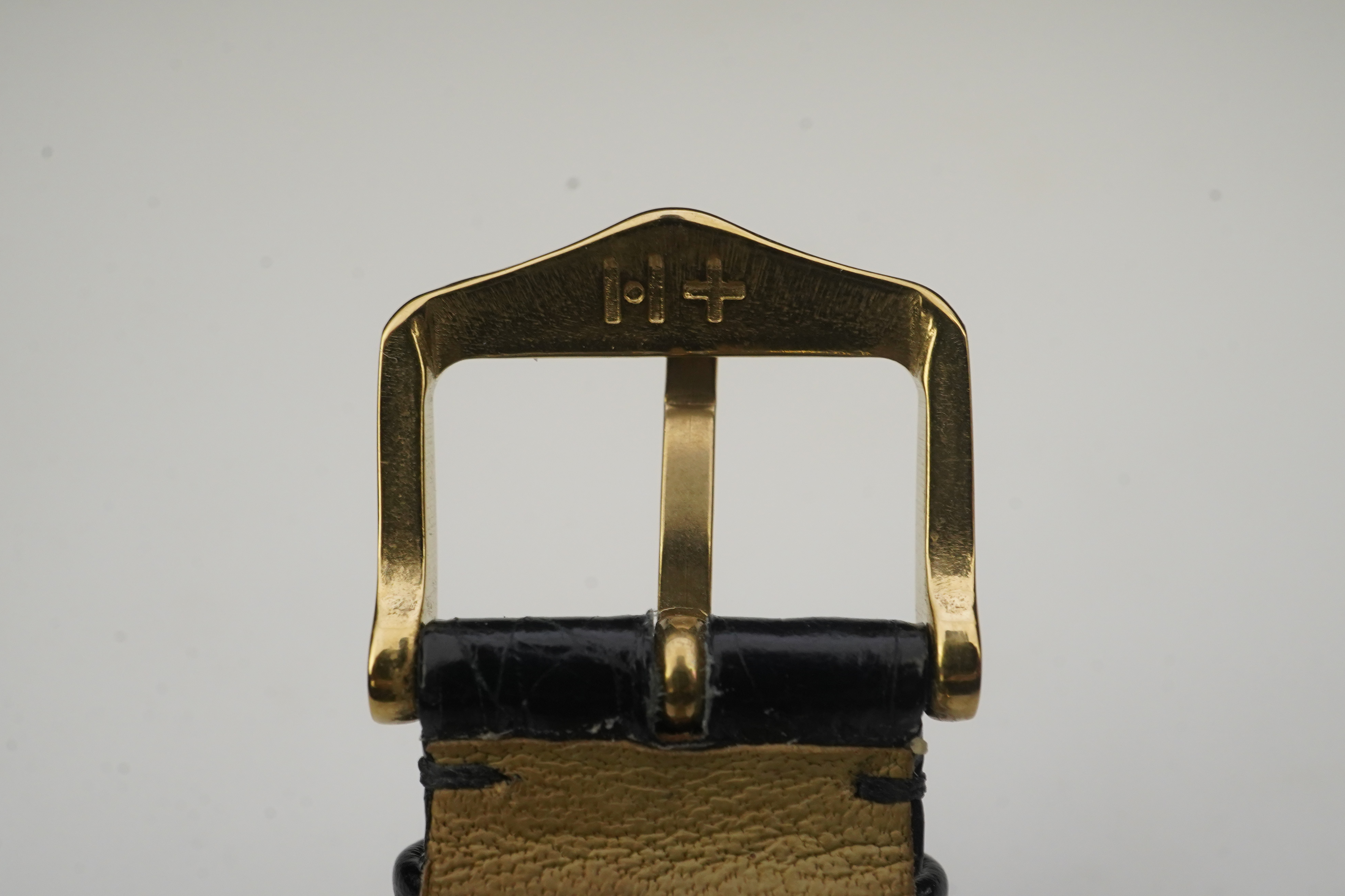 A gentleman's 18ct gold Jaeger LeCoultre manual wind dress wrist watch, on a later associated leather strap